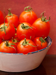 red tomatoes oin old tray