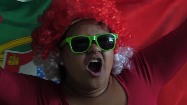 Portuguese Woman Celebrating with National Flag