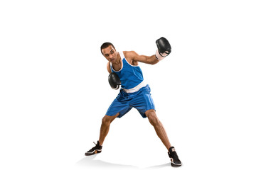 Naklejka na ściany i meble Sporty man during boxing exercise. Photo of boxer on white background
