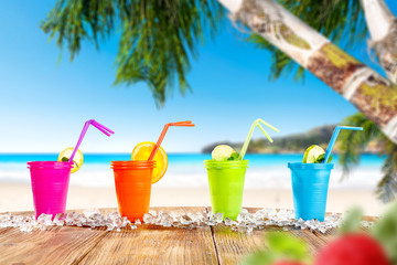 Summer drink on beach and free space for your decoration. 
