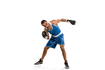 Obraz na płótnie Canvas Sporty man during boxing exercise. Photo of boxer on white background