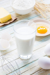 Obraz na płótnie Canvas Ingredients for baking: milk, flour, egg and butter