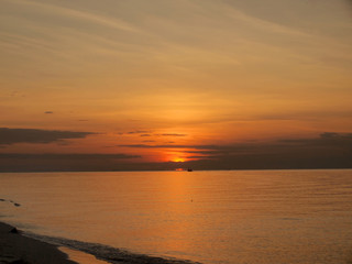 Obraz na płótnie Canvas Slow shutter seascape view and beautiful sunrise