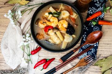 Bowls of Asian soup noodles and vegetables
