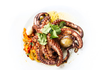 Mediterranean Octopus with vegetables and potatoes
