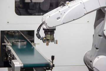 Industry 4.0 Robot concept .The robot arm is working smartly in the shipping department of the factory.