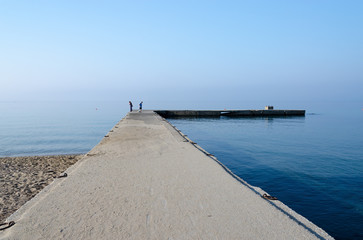 Old pier in Nea Kallikratia, Halkidiki peninsula, Greece