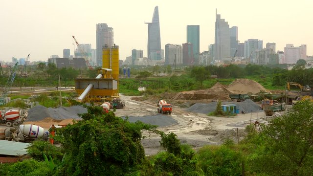 4k Movie of Ho Chi MInh Skyline with Saigon River in the Dust, Ho Chi Minh City, Vietnam