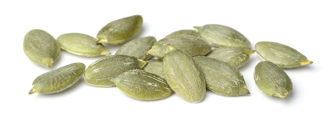 raw pumpkin seeds isolated on white