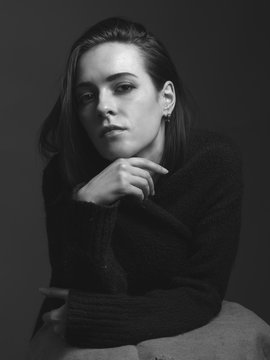 Black and white portrait of young woman. Studio