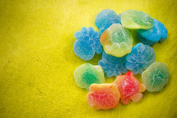 gummies on yellow background