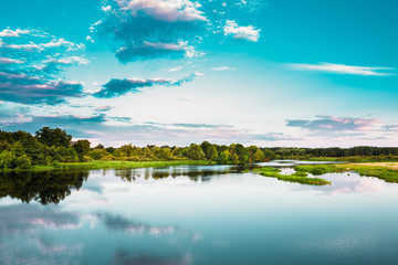 Fototapeta na wymiar River Landscape In Belarus Or European Part Of Russia In Summer 