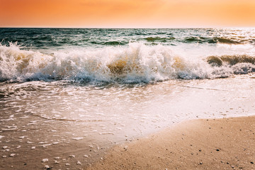 Sea Waves During Storm During Sunset Or Sunrise. Ocean Waves Washing