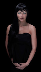 Fototapeta premium mysterious portrait of a girl in the dark, in the fog