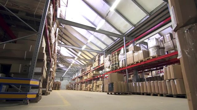 general view of a commercial warehouse with goods in boxes