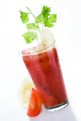 Bloody Mary cocktail in glass on white background.