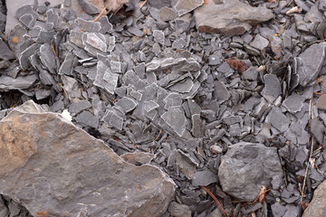 Cracked shale chips abstract texture background. 