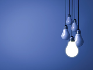 One hanging light bulb glowing on dark blue background with unlit light bulbs . 3D rendering.
