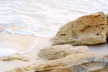 Close up rocks in beautiful beach.