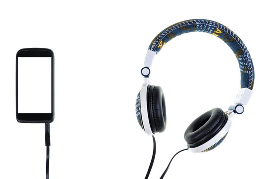 Smartphone and headphone with jeans jacket on a white background, isolated