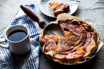Banana cake with cup of coffee for a breakfast on a vintage plate