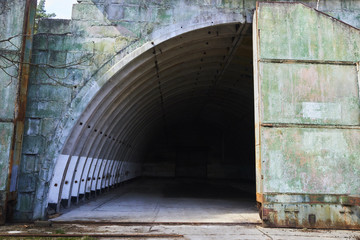  Abandoned old military hangar for storage and maintenance of fighter jets and other military aircraft