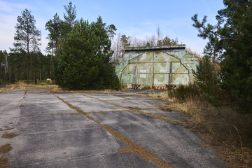 Abandoned old military hangar for storage and maintenance of fighter jets and other military aircraft