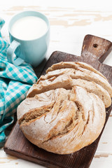 Homemade crusty bread and milk