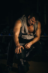 Fototapeta na wymiar Portrait of a handsome muscular bodybuilder