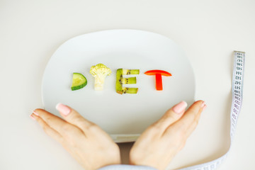 Diet. written with vegetables in healthy nutrition concept