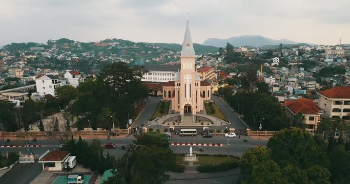 AERIAL 4K: Drone flight over Nicholas of Bari Cathedral (Church of Chicken) in Dalat Vietnam. It is the most famous church of Dalat City by unique and historical architectures