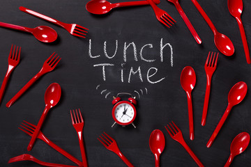 Lunch time written on blackboard with chalk