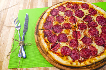 Hot Homemade Pepperoni Pizza Ready to Eat. Bon Appetit