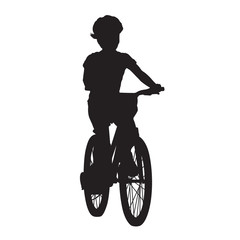 Fototapeta na wymiar Small kid riding bicycle, isolated vector silhouette