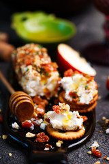HONEY, APRICOT, AND ALMOND GOAT CHEESE SPREAD.selective focus