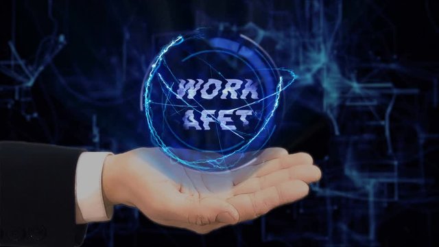 Painted hand shows concept hologram Work safety on his hand. Drawn man in business suit with future technology screen and modern cosmic background