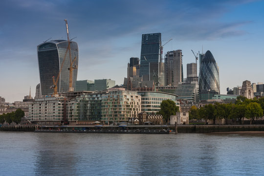 Thames embankment and london skyscrapers in City of London in the sunrise time