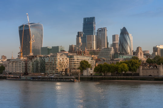 Thames embankment and london skyscrapers in City of London in the sunrise time