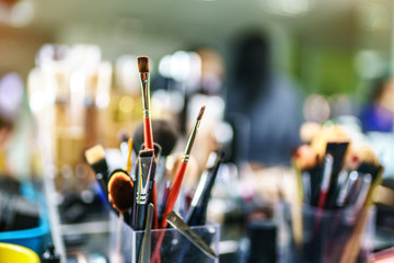 Closeup photo of makeup brushes in the beauty salon