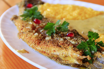 Trout fried with banusz and mushroom soup. Tasty dish