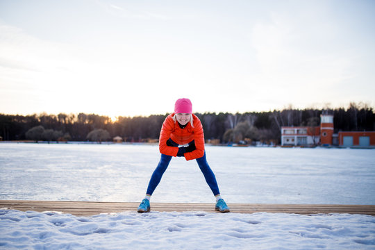 Picture of sports woman on morning exercise in winter