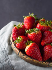 Dish of Fresh strawberries on a green cloth