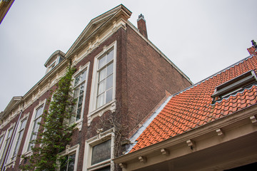 Fototapeta na wymiar Old Houses Streets Haarlem City Colored Holland Stone Bricks