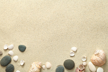 Fototapeta na wymiar Sand, Beach Background with Shells and Stones