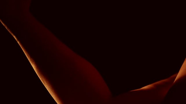 Silhouette of a  female body on black background