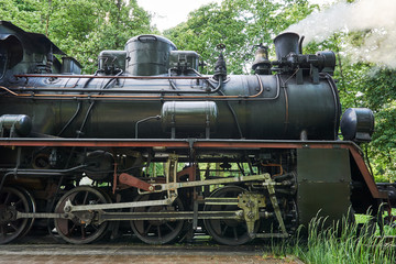 Fototapeta na wymiar Fragment of mechanism old locomotive in Poland.