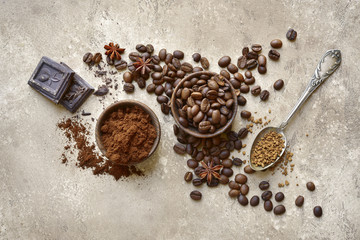 Ground coffee and coffee beans with spices.Top view.