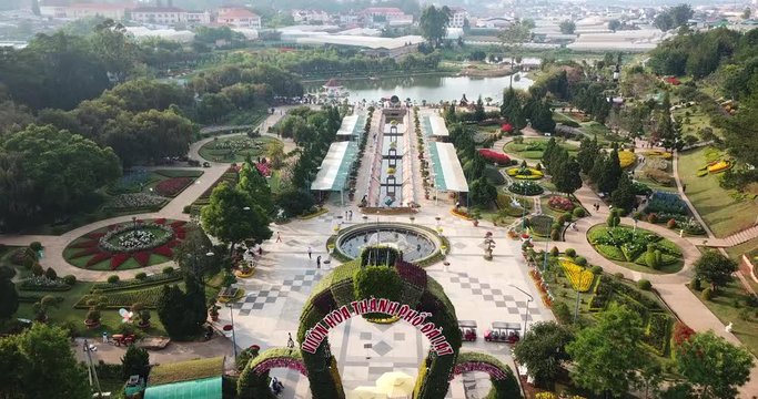 AERIAL 4K: People enjoy the spring flowers in the Flower Park of Dalat city,Vietnam