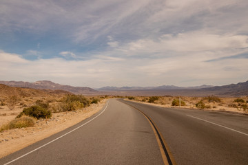Fototapeta na wymiar A Deserted Desert Road