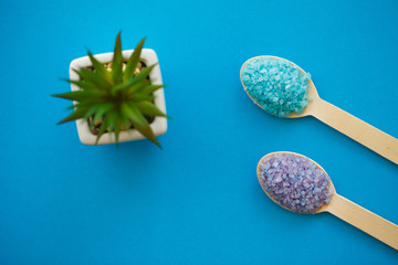 Spa Accessories. Bath Salt Beauty Treatment on Blue Background.